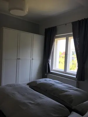 Ein Bett oder Betten in einem Zimmer der Unterkunft Potsdam-Krampnitz