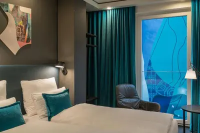 Ein Bett oder Betten in einem Zimmer der Unterkunft Motel One Berlin-Alexanderplatz