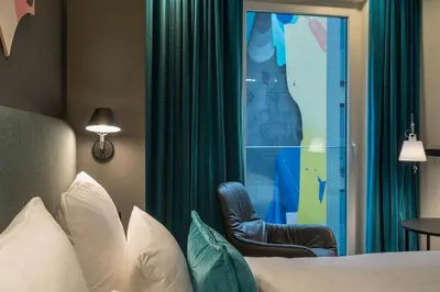 Ein Bett oder Betten in einem Zimmer der Unterkunft Motel One Berlin-Alexanderplatz