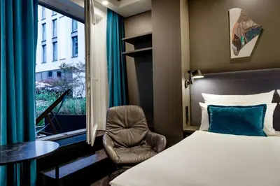 Ein Bett oder Betten in einem Zimmer der Unterkunft Motel One Berlin-Alexanderplatz