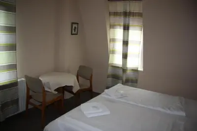 Ein Bett oder Betten in einem Zimmer der Unterkunft Hotel Zum goldenen Stern