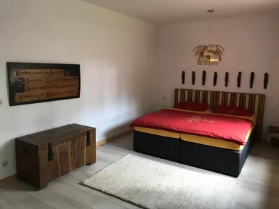Ein Bett oder Betten in einem Zimmer der Unterkunft Alexanderhaus, Pension und Restaurant