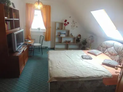 Ein Bett oder Betten in einem Zimmer der Unterkunft Ferienhaus Emmelie