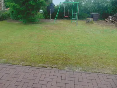 Ein Garten an der Unterkunft Ferienhaus Emmelie