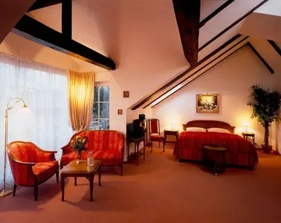 Ein Bett oder Betten in einem Zimmer der Unterkunft Gasthaus Stobbermühle