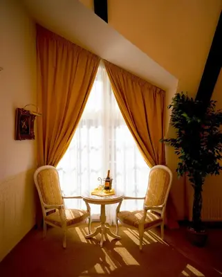 Ein Sitzbereich in der Unterkunft Gasthaus Stobbermühle