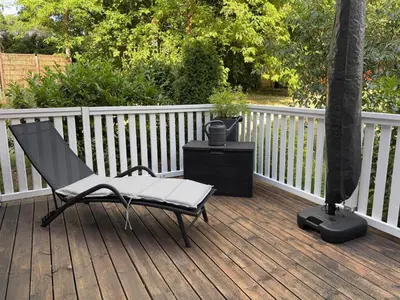 Ein Balkon oder eine Terrasse in der Unterkunft Toms Stuga Ferienwohnung