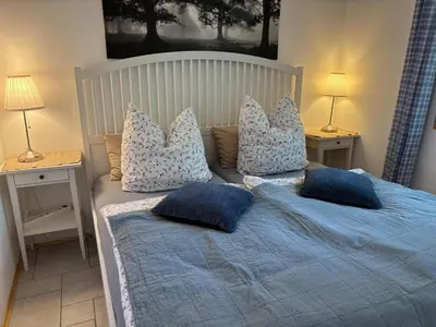 Ein Bett oder Betten in einem Zimmer der Unterkunft Toms Stuga Ferienwohnung