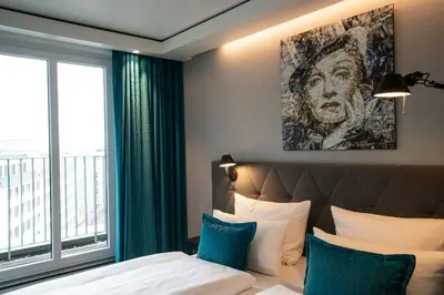Ein Bett oder Betten in einem Zimmer der Unterkunft Motel One Berlin-Spittelmarkt