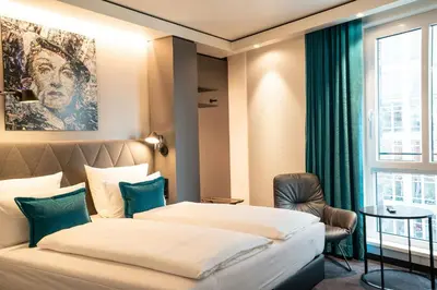 Ein Bett oder Betten in einem Zimmer der Unterkunft Motel One Berlin-Spittelmarkt