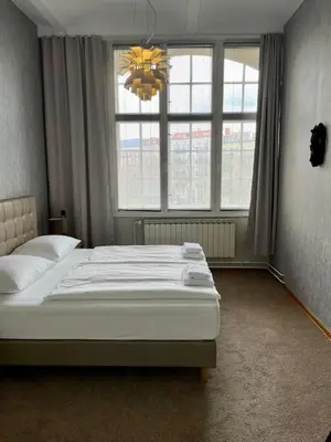 Ein Bett oder Betten in einem Zimmer der Unterkunft berlincity