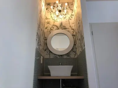 Ein Badezimmer in der Unterkunft berlincity