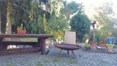 Ein Garten an der Unterkunft Ferienhaus am See