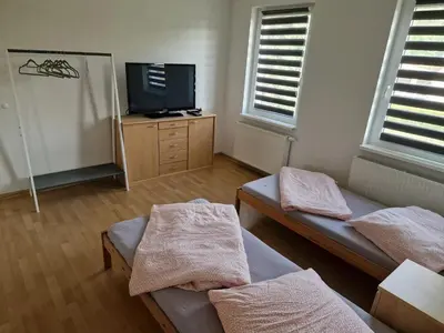 Ein Bett oder Betten in einem Zimmer der Unterkunft Ferienhaus am See