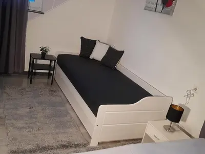 Ein Bett oder Betten in einem Zimmer der Unterkunft Ferienwohnung Berlin - Schönefeld Flughafen mit Küche