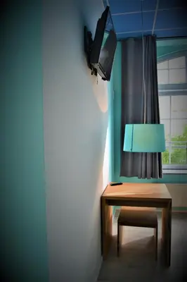 TV/Unterhaltungsangebot in der Unterkunft Singer109 Hostel, Hotel & Apartment