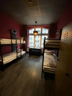 Ein Bett oder Betten in einem Zimmer der Unterkunft Singer109 Hostel, Hotel & Apartment