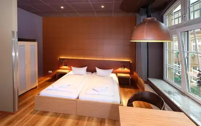 Ein Bett oder Betten in einem Zimmer der Unterkunft Singer109 Hostel, Hotel & Apartment