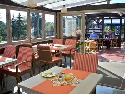 Ein Restaurant oder anderes Speiselokal in der Unterkunft Landhotel Krausnick