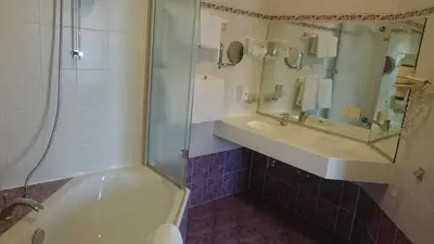 Ein Badezimmer in der Unterkunft Landhotel Krausnick