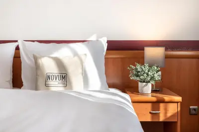 Ein Bett oder Betten in einem Zimmer der Unterkunft Hotel Aldea Berlin