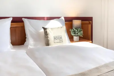 Ein Bett oder Betten in einem Zimmer der Unterkunft Hotel Aldea Berlin