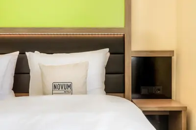 Ein Bett oder Betten in einem Zimmer der Unterkunft Hotel Aldea Berlin