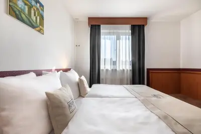 Ein Bett oder Betten in einem Zimmer der Unterkunft Hotel Aldea Berlin