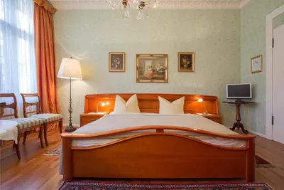 Ein Bett oder Betten in einem Zimmer der Unterkunft Das Literaturhotel Berlin