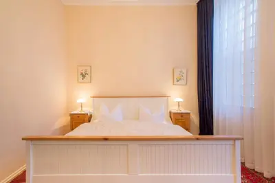Ein Bett oder Betten in einem Zimmer der Unterkunft Das Literaturhotel Berlin