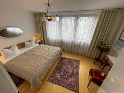 Ein Bett oder Betten in einem Zimmer der Unterkunft Das Literaturhotel Berlin