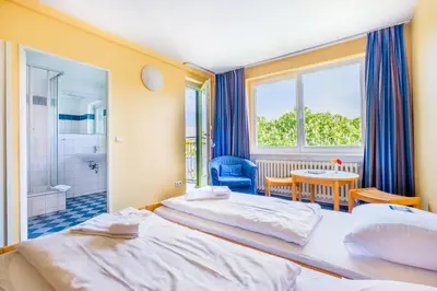 Ein Bett oder Betten in einem Zimmer der Unterkunft martas Gästehäuser Hauptbahnhof Berlin