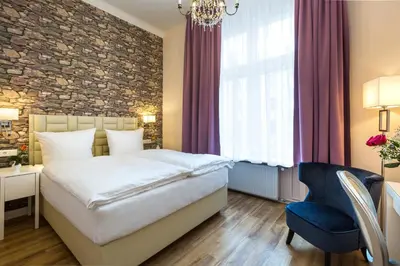 Ein Bett oder Betten in einem Zimmer der Unterkunft Arco Smart Hotel Berlin