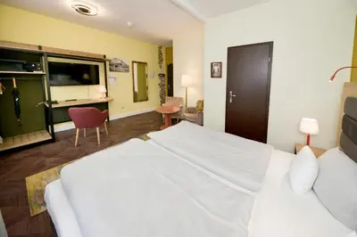 Ein Bett oder Betten in einem Zimmer der Unterkunft Arco Smart Hotel Berlin
