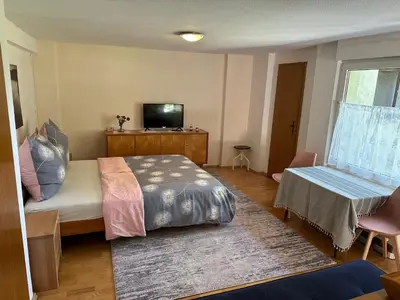 Ein Bett oder Betten in einem Zimmer der Unterkunft Bungalow am Wassergrundstück