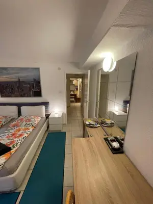 Ein Bett oder Betten in einem Zimmer der Unterkunft Messe Apartment Berlin