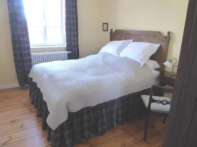 Ein Bett oder Betten in einem Zimmer der Unterkunft B&B Fiddler's Inn