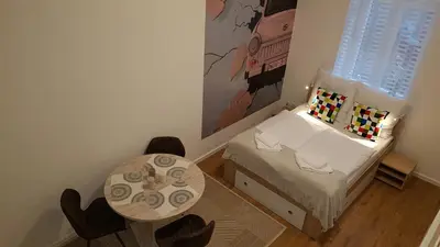 Ein Bett oder Betten in einem Zimmer der Unterkunft Studio Apartment for 3