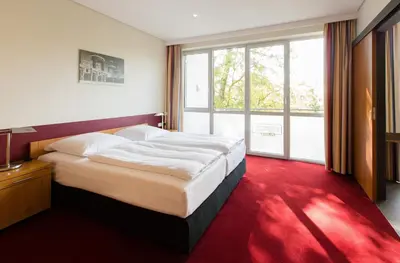Ein Bett oder Betten in einem Zimmer der Unterkunft Aparion Apartments Berlin
