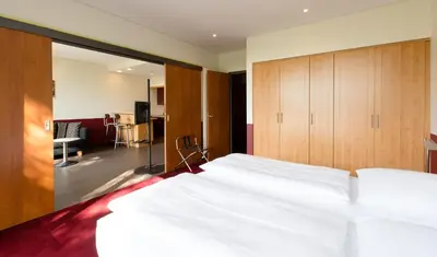 Ein Bett oder Betten in einem Zimmer der Unterkunft Aparion Apartments Berlin
