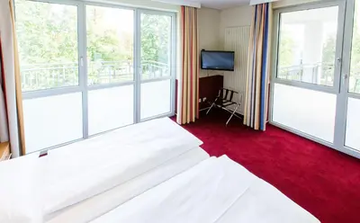 Ein Bett oder Betten in einem Zimmer der Unterkunft Aparion Apartments Berlin