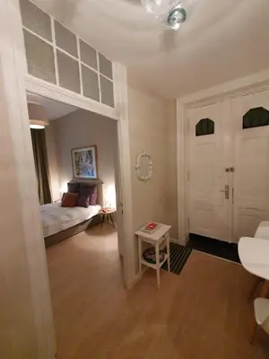 Ein Bett oder Betten in einem Zimmer der Unterkunft Studio City West
