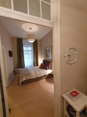Ein Bett oder Betten in einem Zimmer der Unterkunft Studio City West