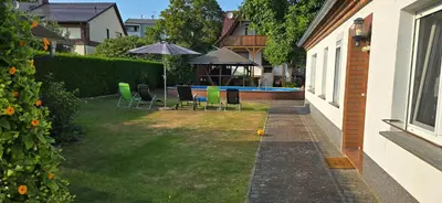 Ein Garten an der Unterkunft Familie Drescher