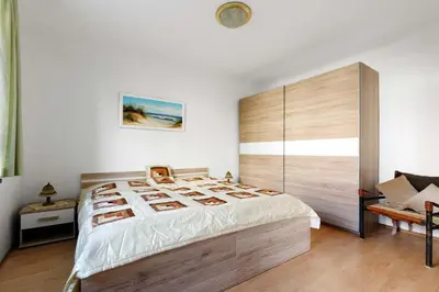 Ein Bett oder Betten in einem Zimmer der Unterkunft Cottage near centrum, paradise