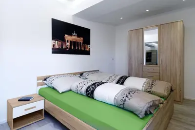 Ein Bett oder Betten in einem Zimmer der Unterkunft Luxusapartment nahe Müggelsee