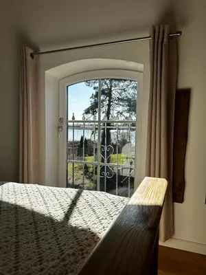 Ein Bett oder Betten in einem Zimmer der Unterkunft Seeidyll an der Wublitz