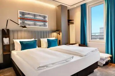 Ein Bett oder Betten in einem Zimmer der Unterkunft Motel One Berlin-Hauptbahnhof
