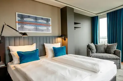 Ein Bett oder Betten in einem Zimmer der Unterkunft Motel One Berlin-Hauptbahnhof