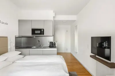 Ein Bett oder Betten in einem Zimmer der Unterkunft HighPark Berlin am Potsdamer Platz